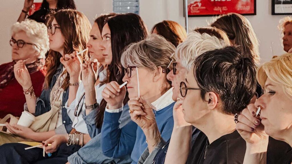 a group of women sitting next to each other