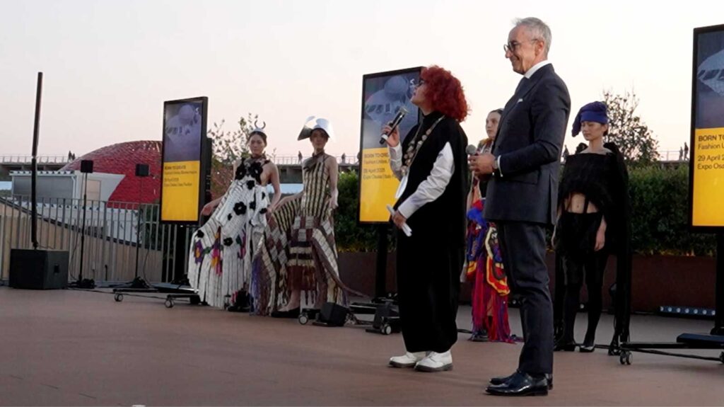 a group of people standing next to each other