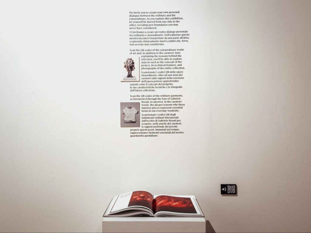 an open book sitting on top of a white table