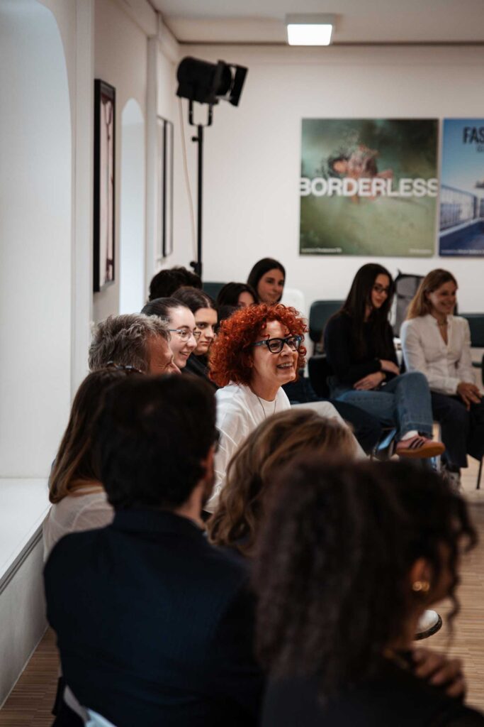 a group of people sitting in a room