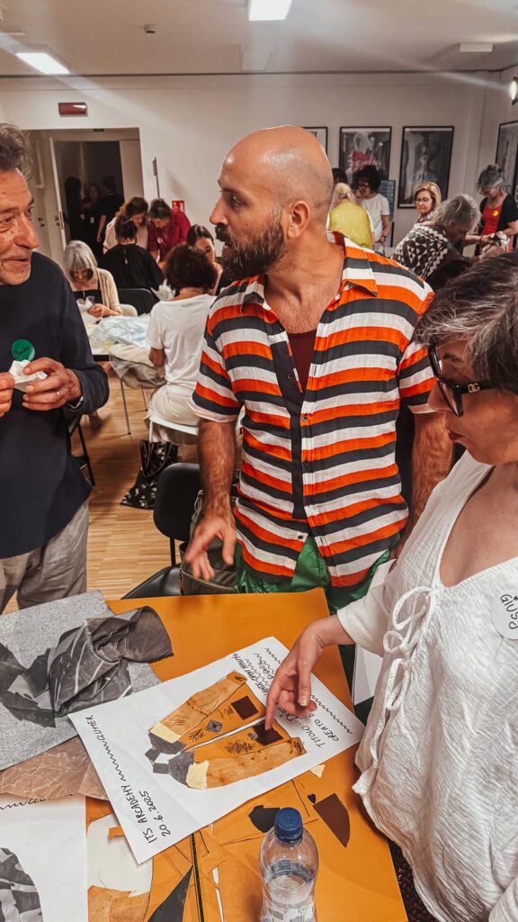 a group of people standing around a table