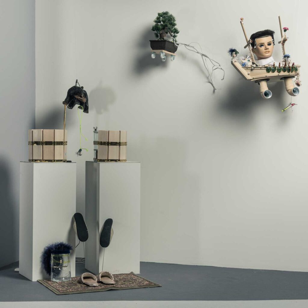 a white room with a sculpture of a man and a horse