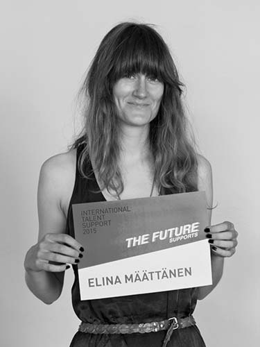 a woman holding a sign that says the future