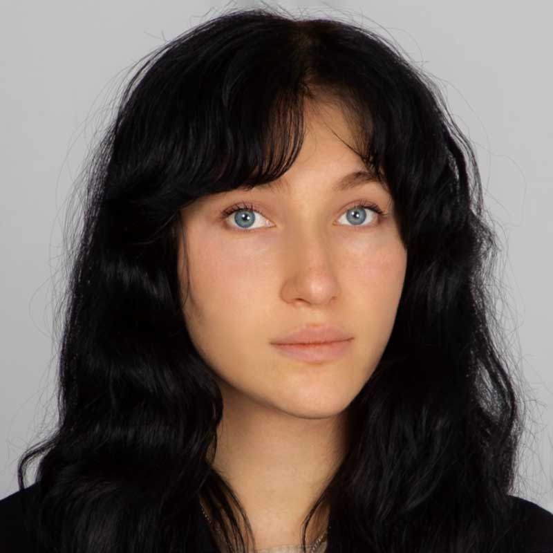 a close up of a person with long hair